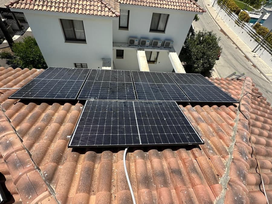 Solar panel installation on a tiled roof in Tala, Cyprus